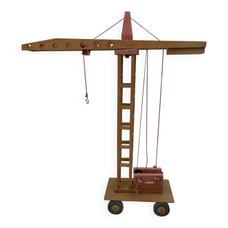 Vintage wooden crane toy from the 60s