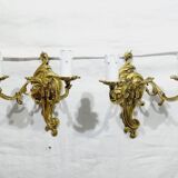 Pair of 2-light bronze wall lights, St. Louis XV