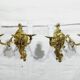 Pair of 2-light bronze wall lights, St. Louis XV