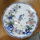 Ceramic dish with Chinese decorations