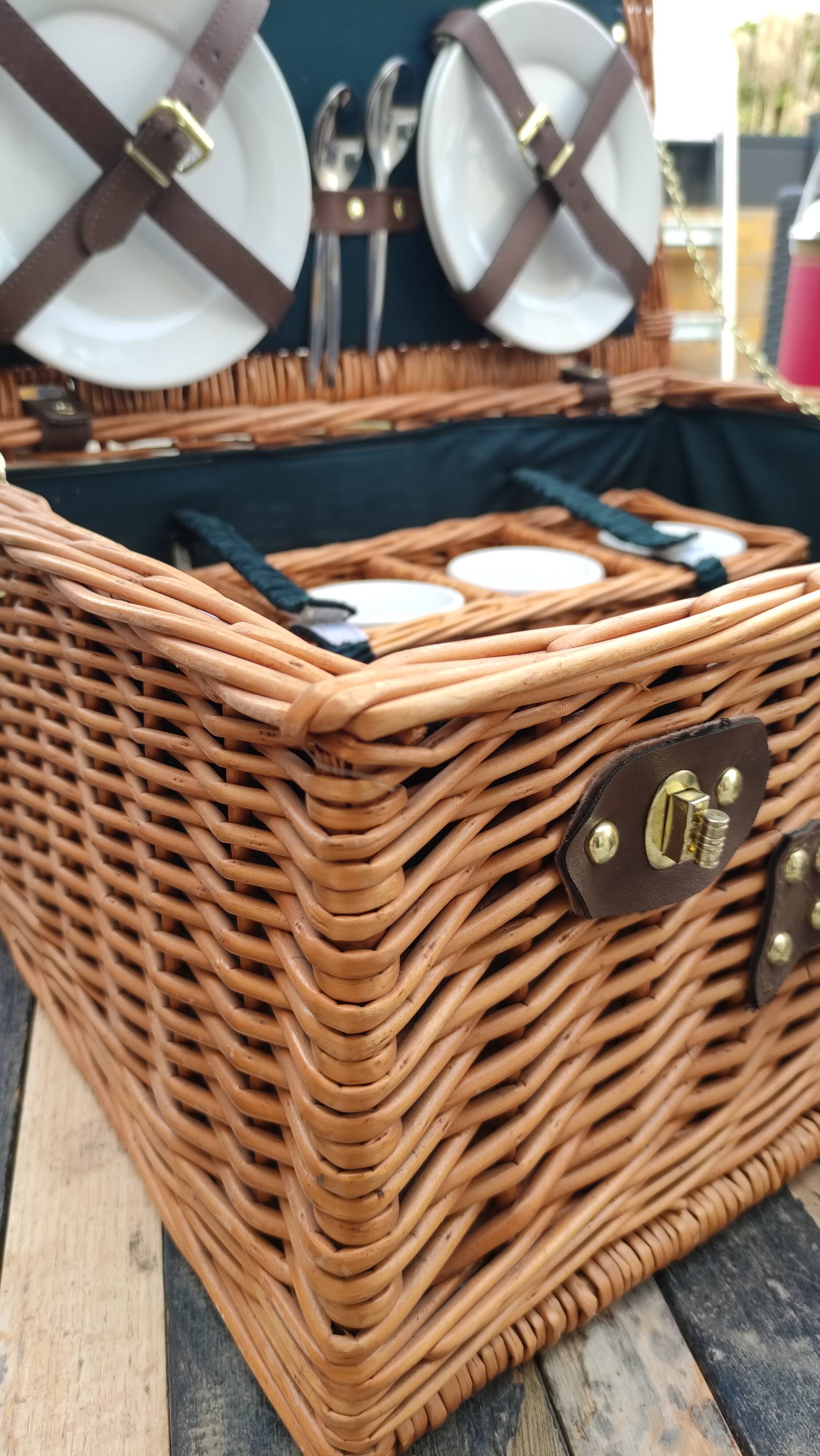 Picnic basket with white porcelain crockery