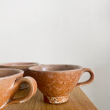 Three antique stoneware cups