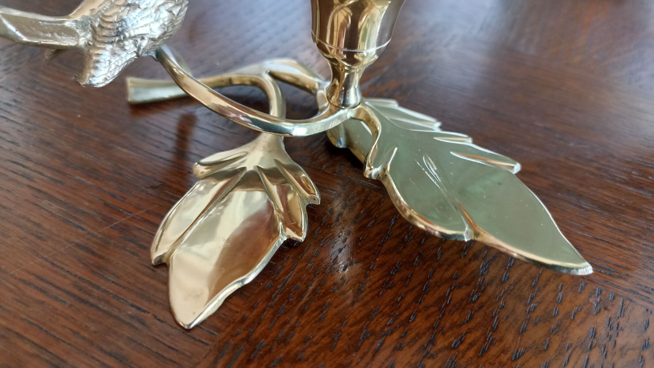 Brass cup in the shape of a bird and flowers