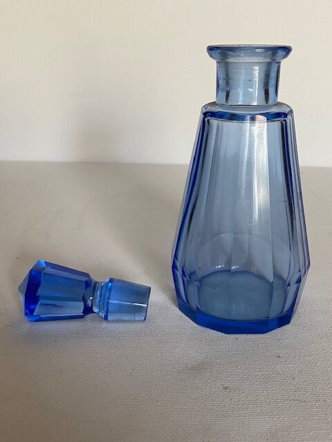 Blue chiseled glass bottle