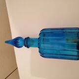 Polished in blue glass
