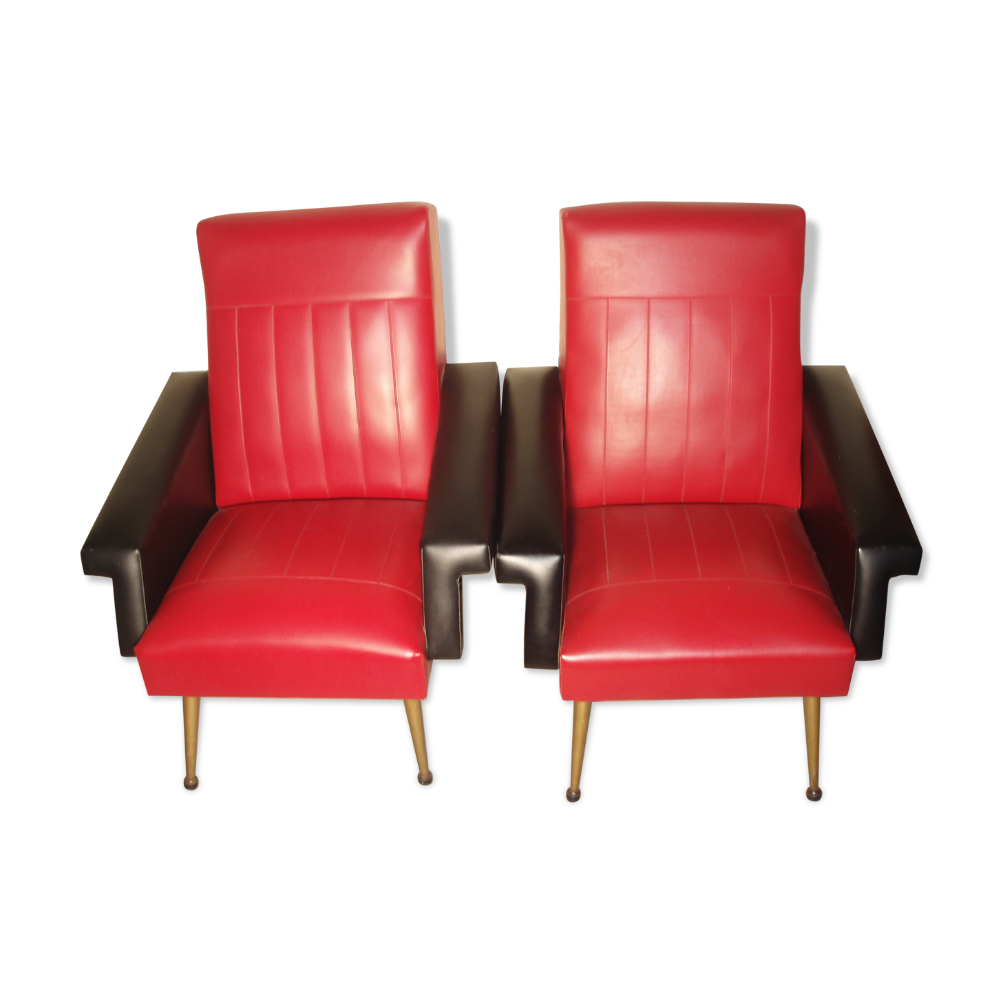 Pair of chairs in leather of the 1970s
