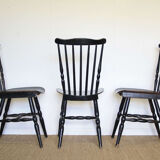 Three black Baumann bistro chairs