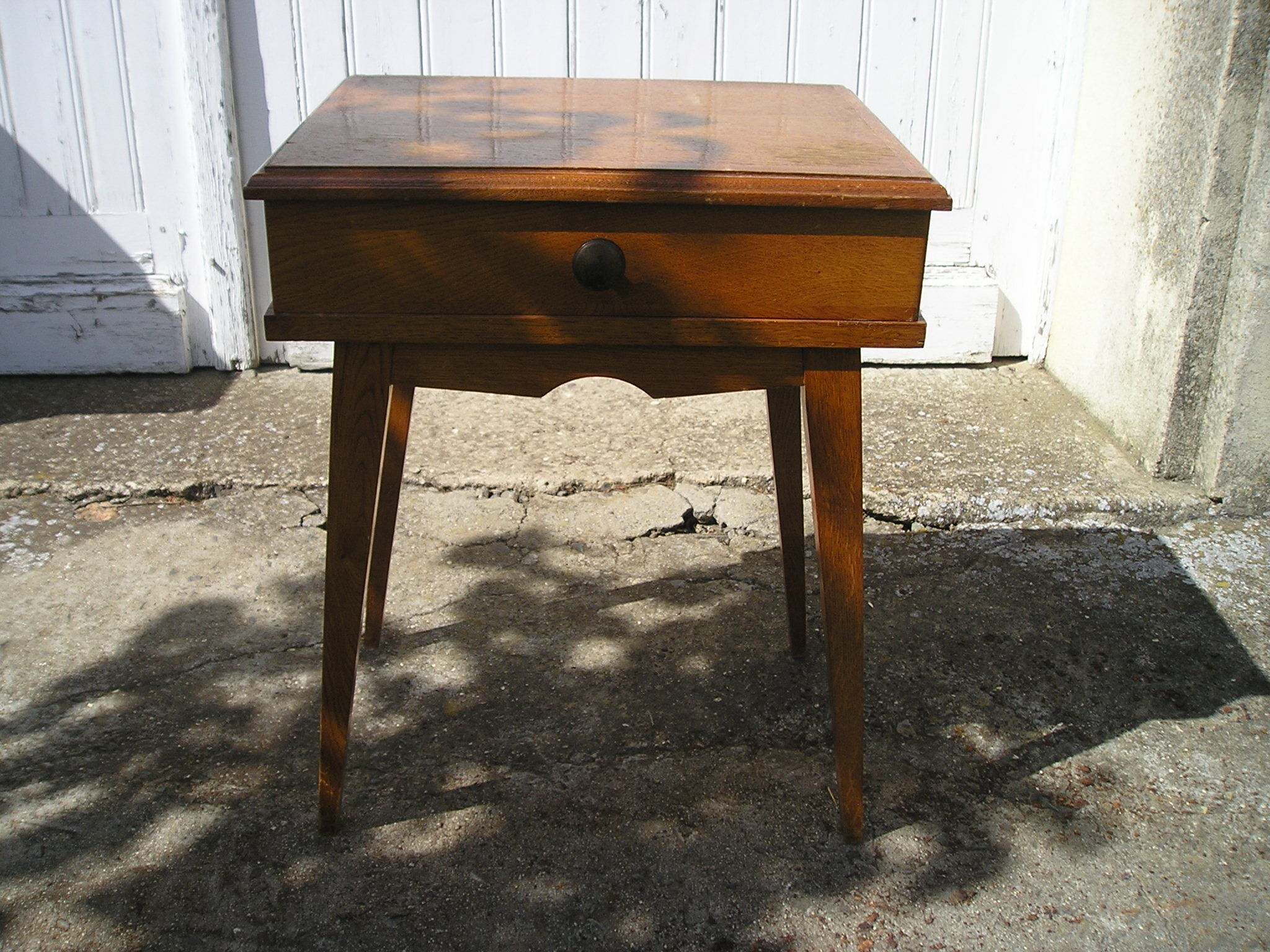 Oak bedside or sofa tip, compass feet and 1 drawer