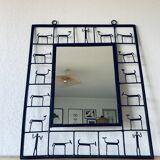 Mirror in ironwork of art