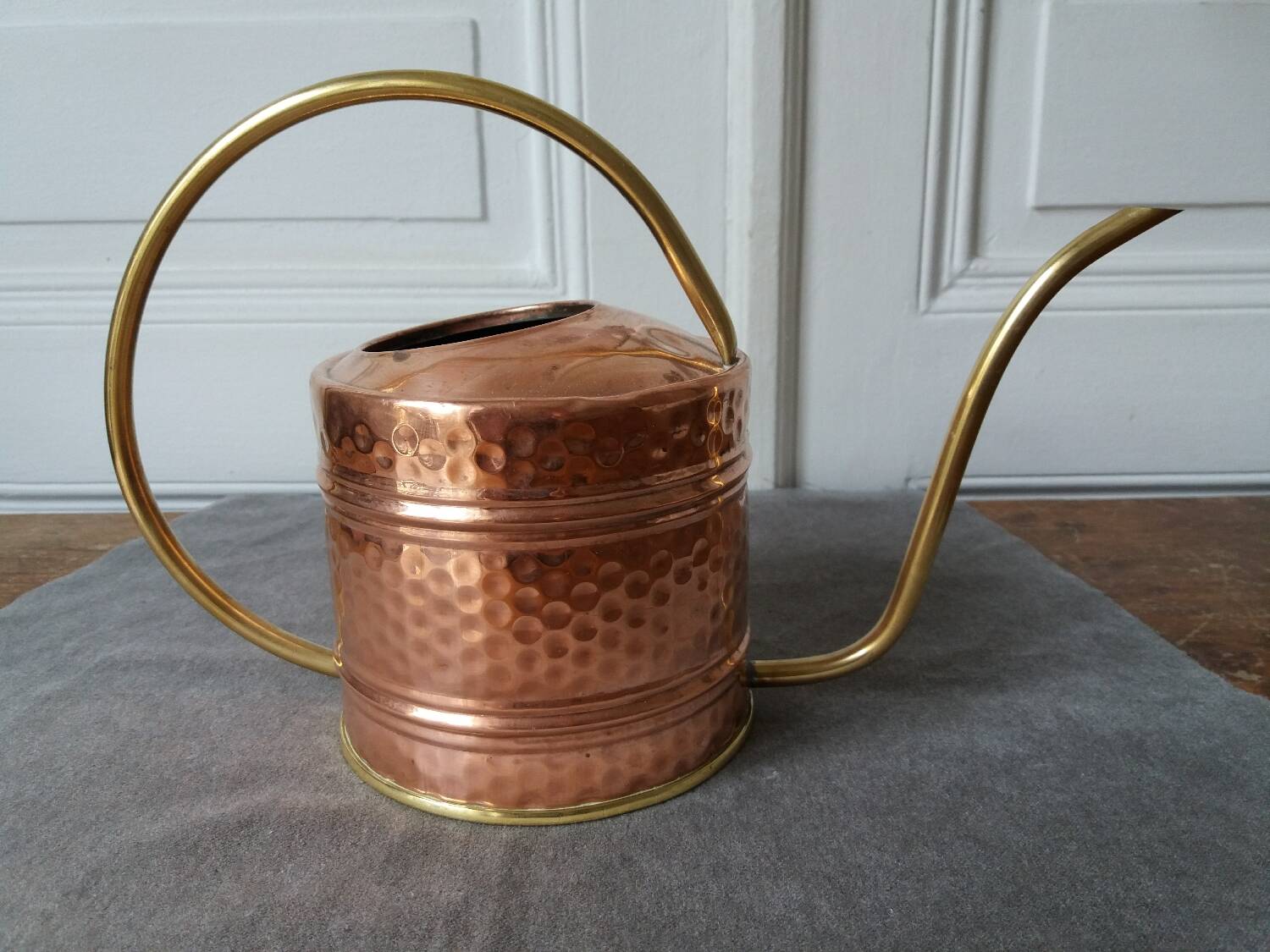 Old hammered copper watering can