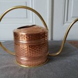 Old hammered copper watering can