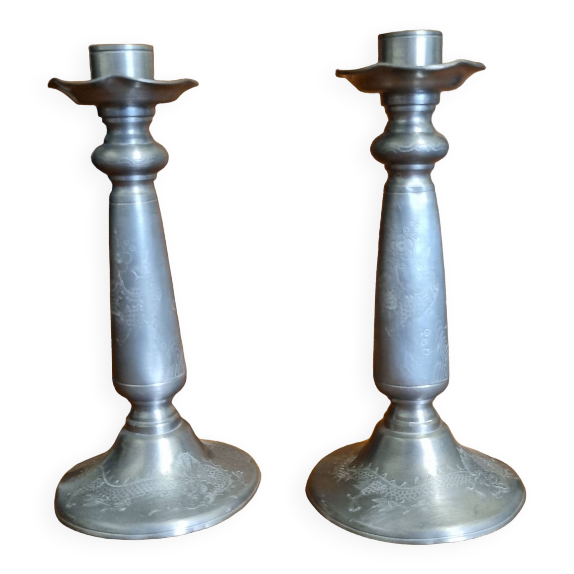 Pair of old Chinese candlesticks in engraved pewter