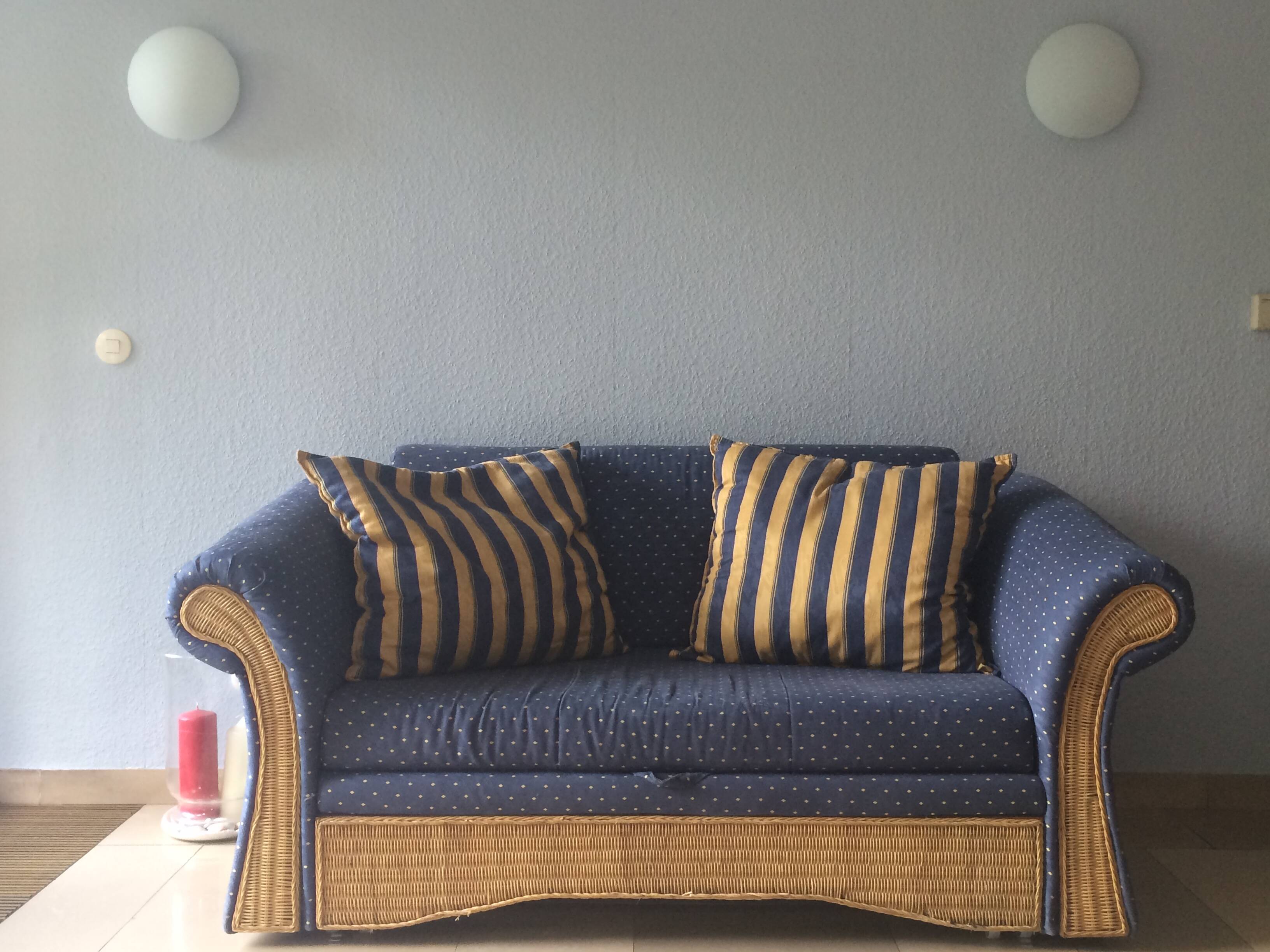 Vintage colonial-style rattan sofa bed