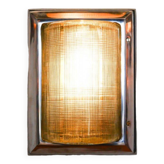 Old wall lamp in polished cast aluminum with double ribbed glass.