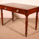 flat desk with two drawers from the 19th century in mahogany and inlays