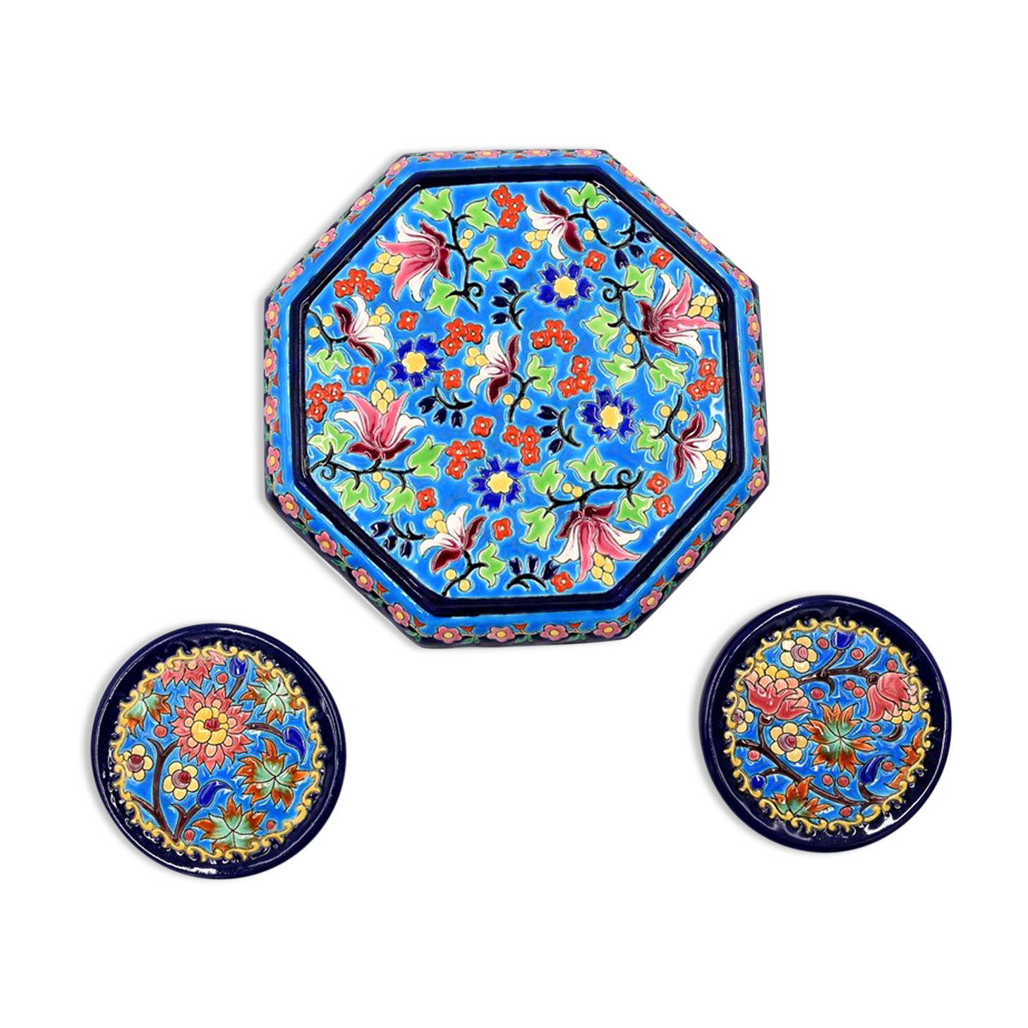 A flat bottom and two enamel bottle bottoms of Longwy