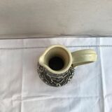 Former beige cracked ceramic pitcher