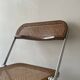 Plia folding chair in chrome and cane by Giancarlo Piretti, design 1970.