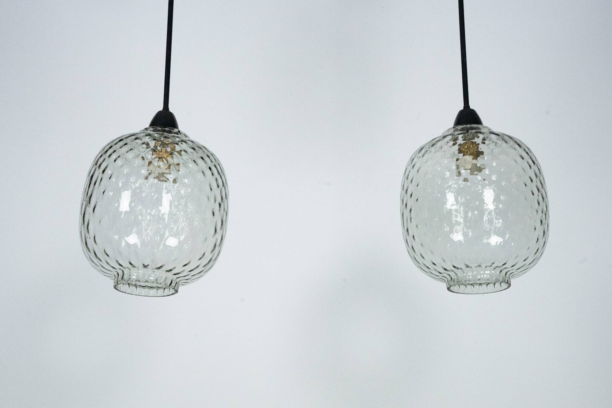 Pair of Mid-Century pendant lamps in smoked Murano glass, Italy, 1950s