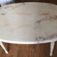 Table basse ovale marbre