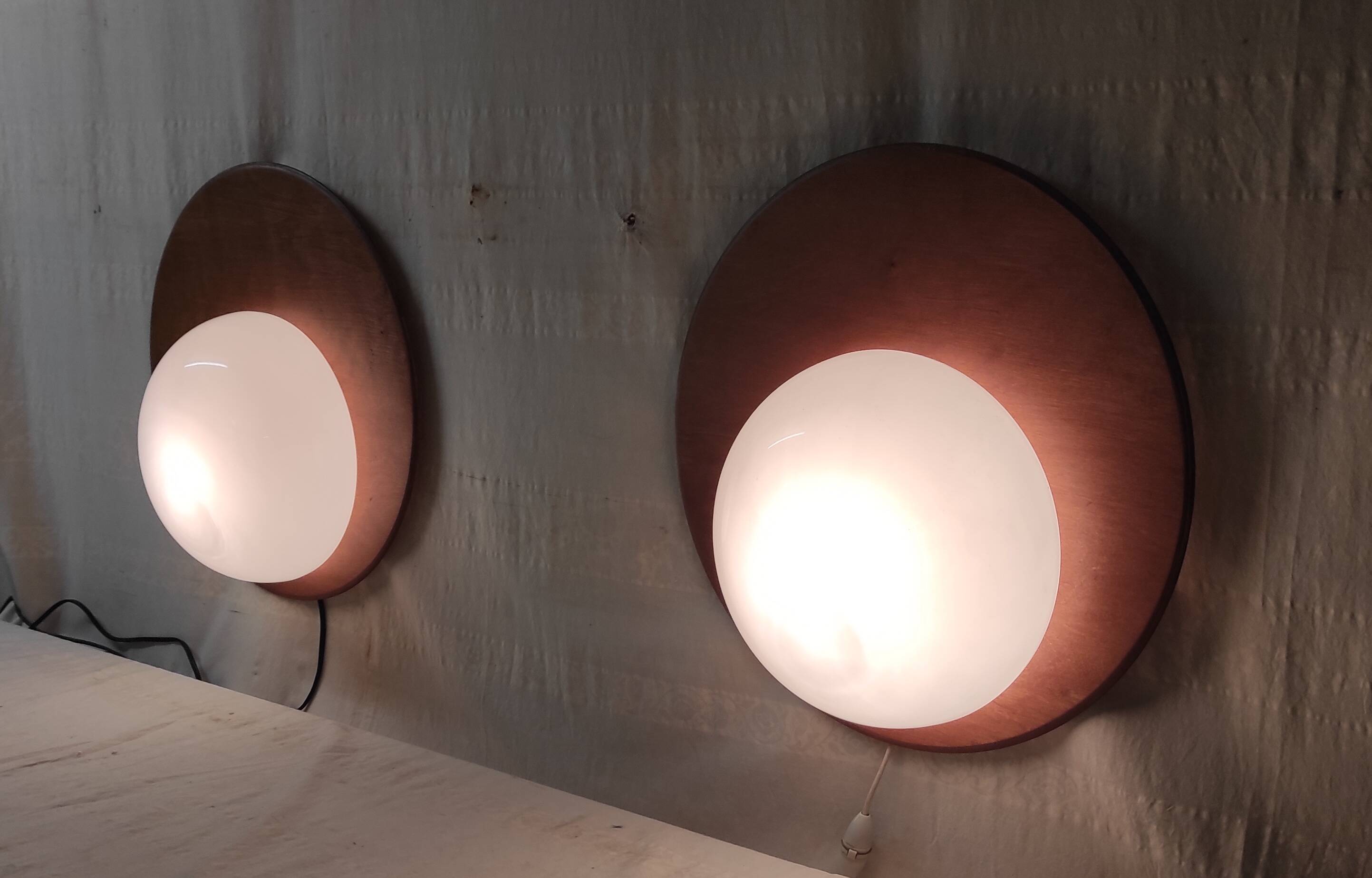 Designer wall lights in wood and opaline globe - mid-20th century