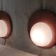 Designer wall lights in wood and opaline globe - mid-20th century