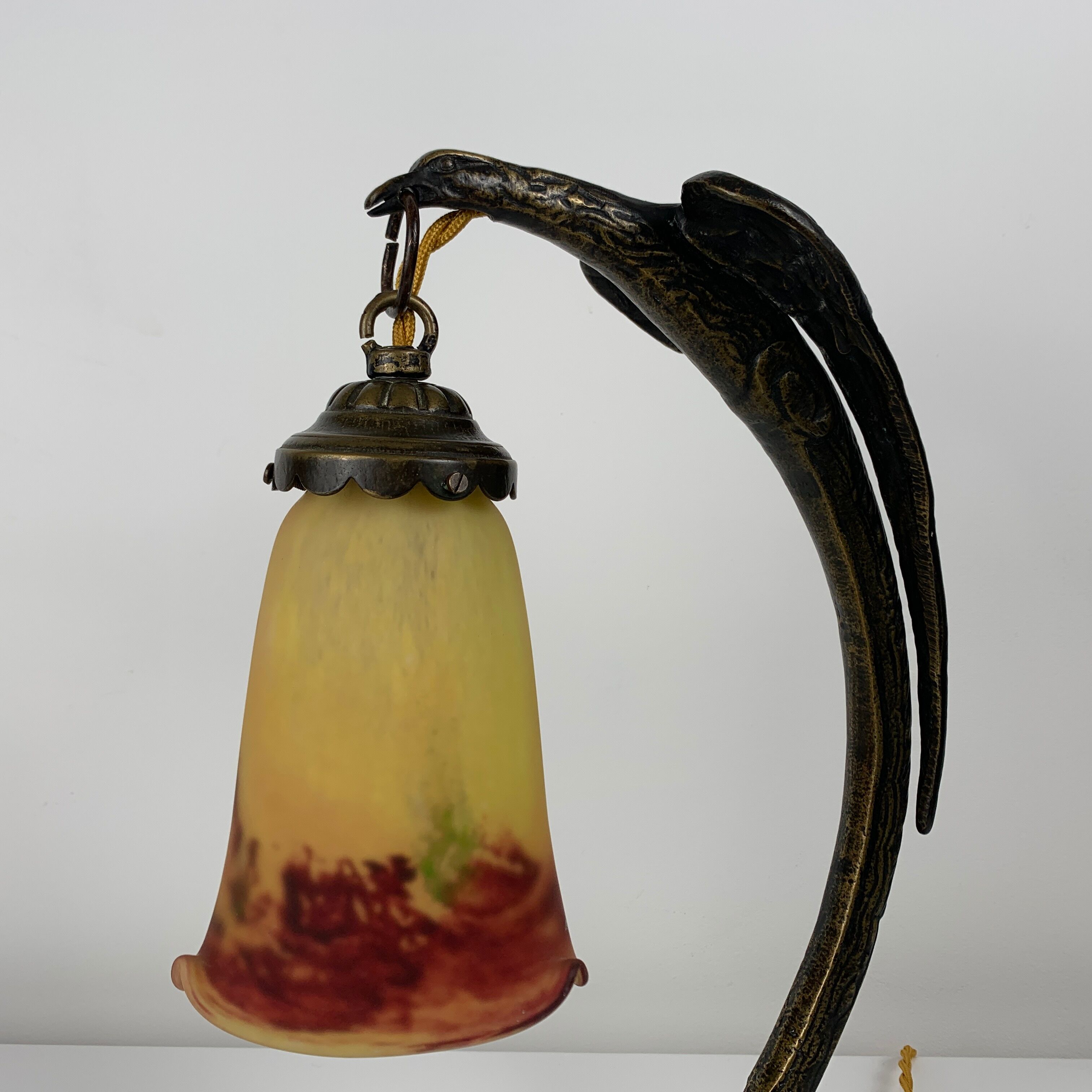 Bronze eagle lamp patinated and Art Nouveau style glass pate