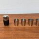Set of 5 metal shot glasses in German owl style from the mid-century, 1960s.