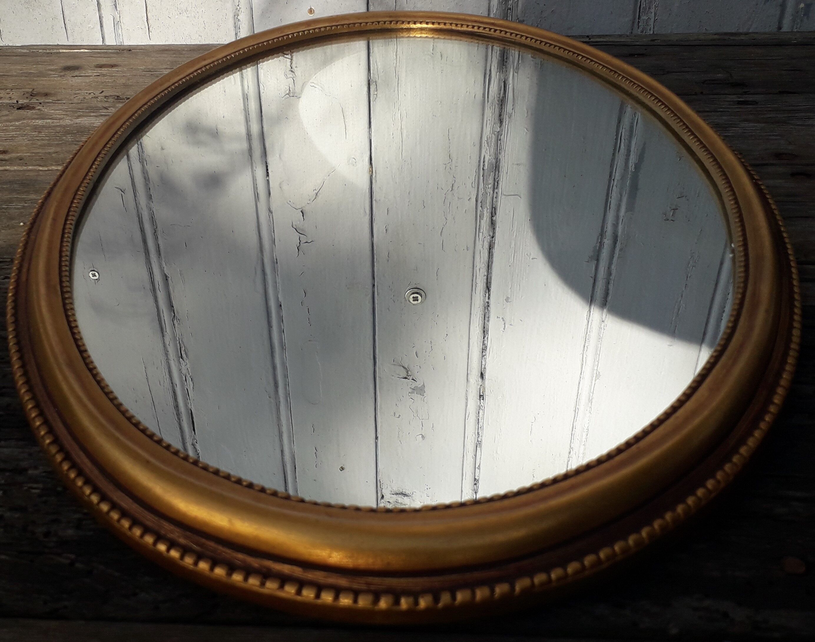 Gilded plaster mirror 55 x 35 cm