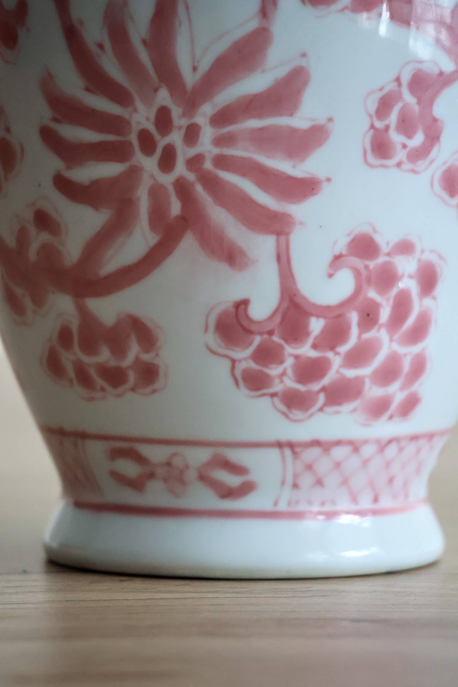 Chinese style flower vase with red and white flowers