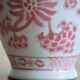 Chinese style flower vase with red and white flowers