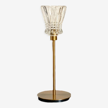 Table lamp with an old tulip lampshade in crystal glass and a golden base