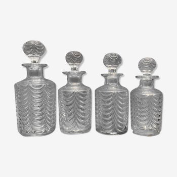 Suite de 4 flacons à parfum XIXe en cristal de Baccarat