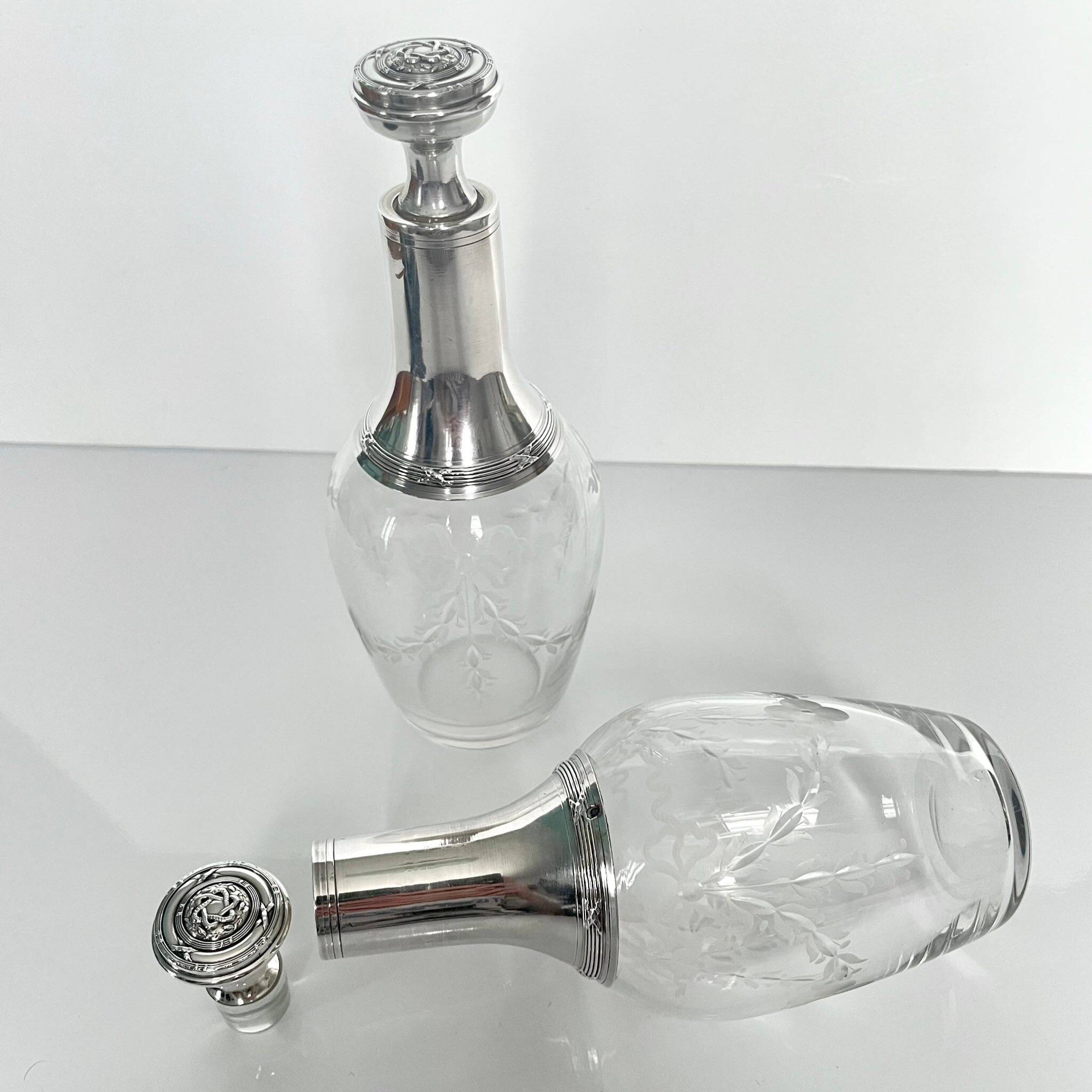 Pair of crystal and silver decanters - early 20th century