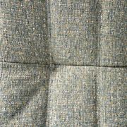 Fauteuil et pouf Togo en tweed émeraude