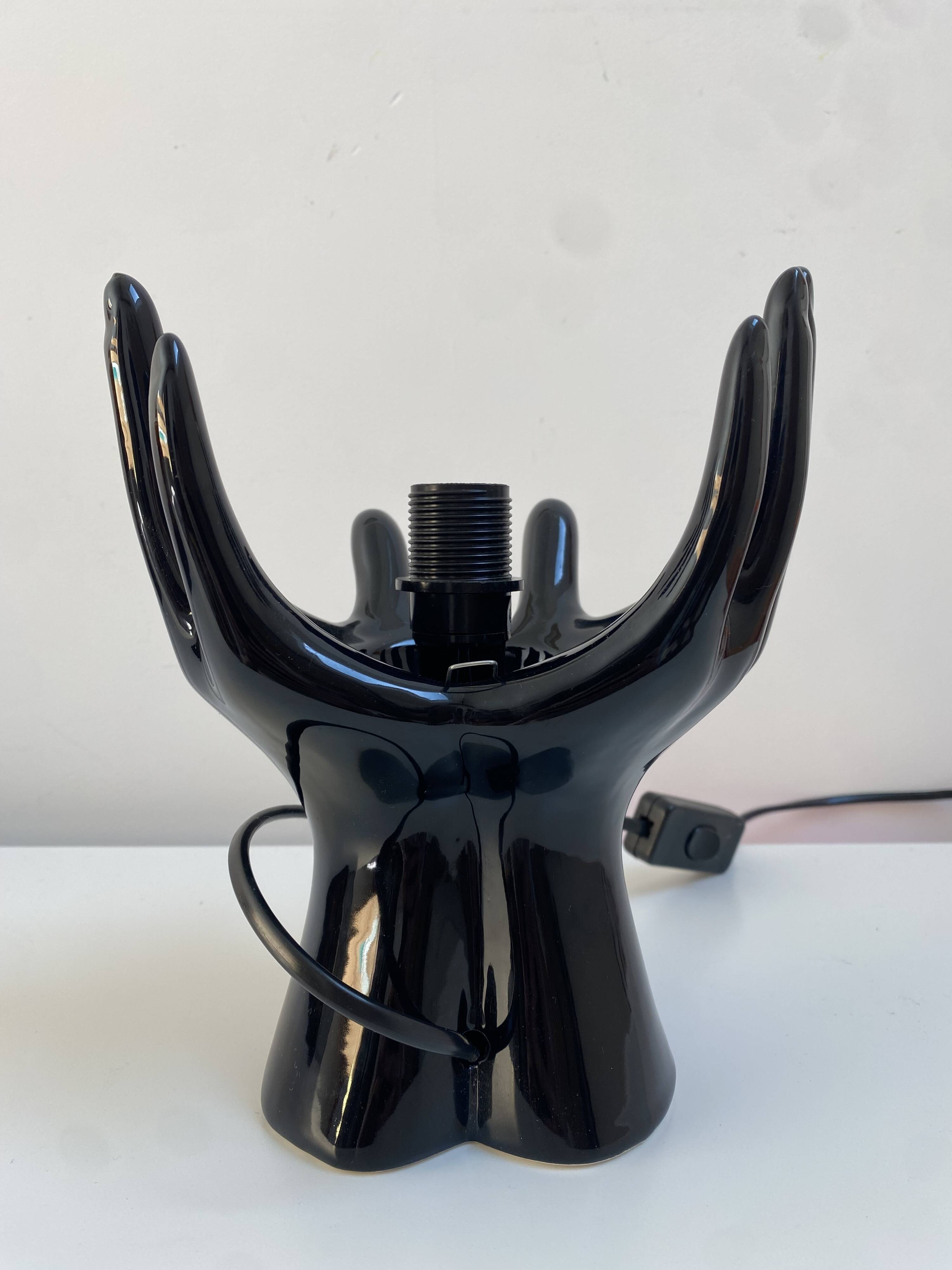 Sculpted ceramic globe lamp.