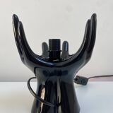 Sculpted ceramic globe lamp.