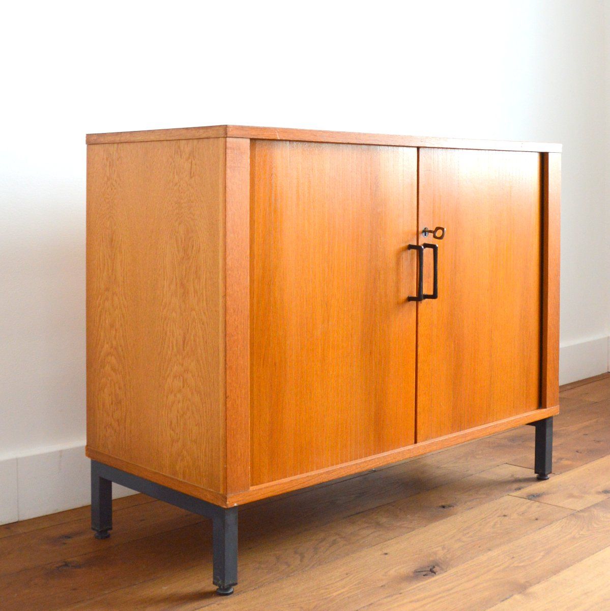 Storage cabinet with sliding curtain shutter 1950s