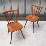 Pair of bistro chairs with bars