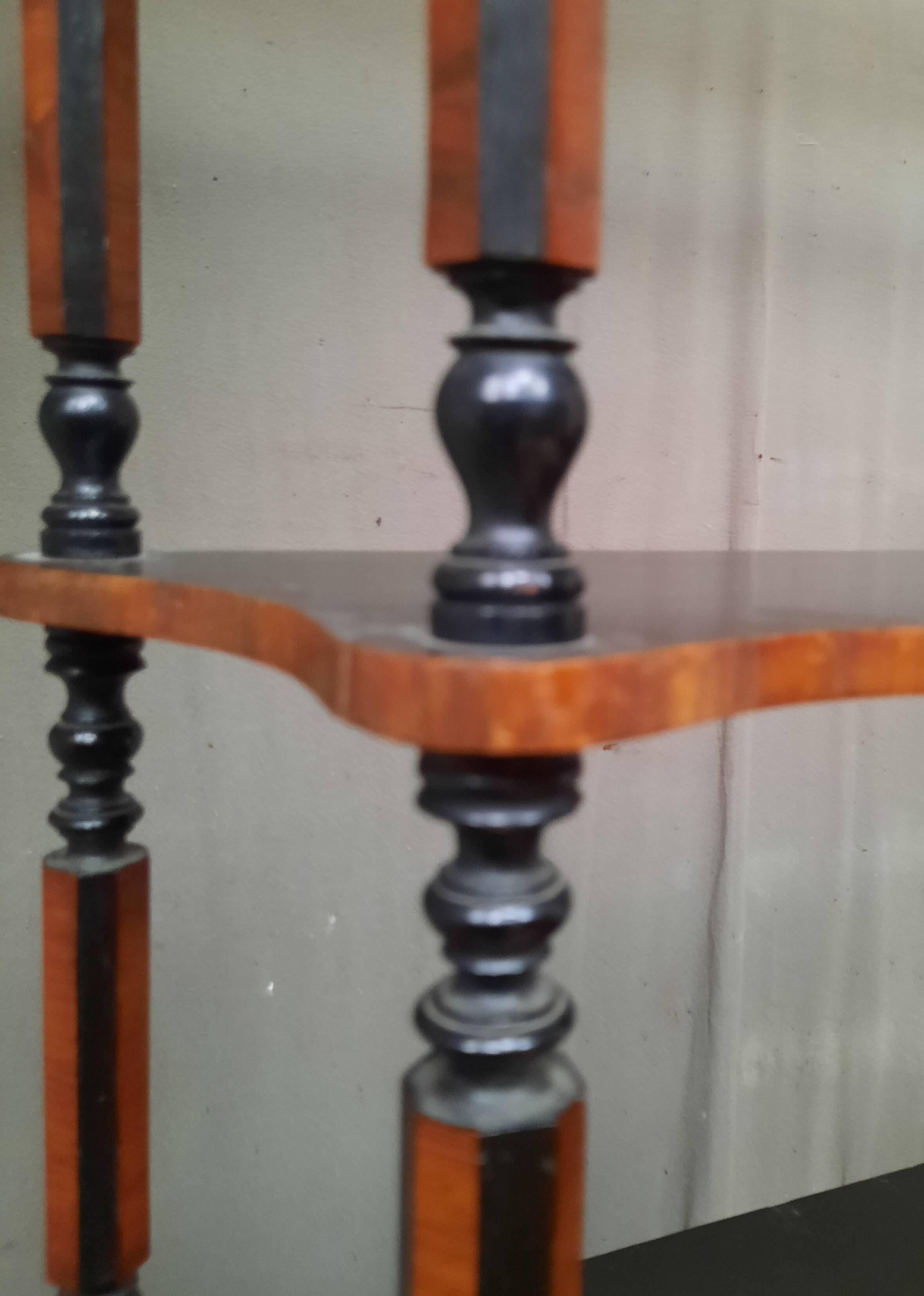 Blackened wooden wall shelf