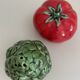 Ceramic artichoke tomato salt and pepper shakers in slip