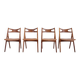 Set of 4 oak Hans Wegner Sawbuck model CH29 chairs by Carl Hansen and Son