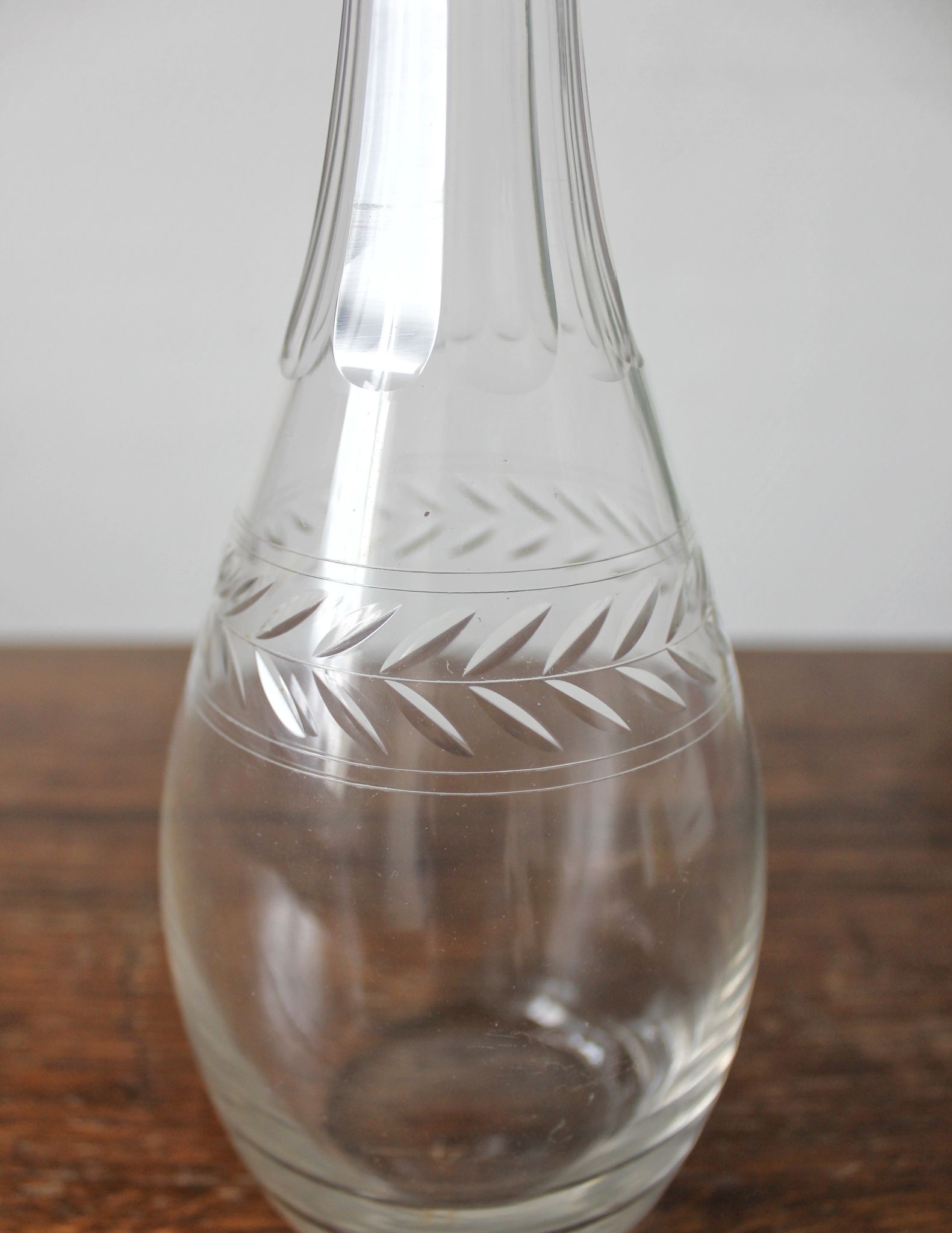 Antique crystal carafe engraved with a laurel leaf frieze