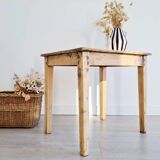 Antique farmhouse table in raw wood
