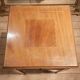 Nightstand with veneer and 4 drawers.