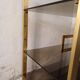 Brass shelf, smoked glass