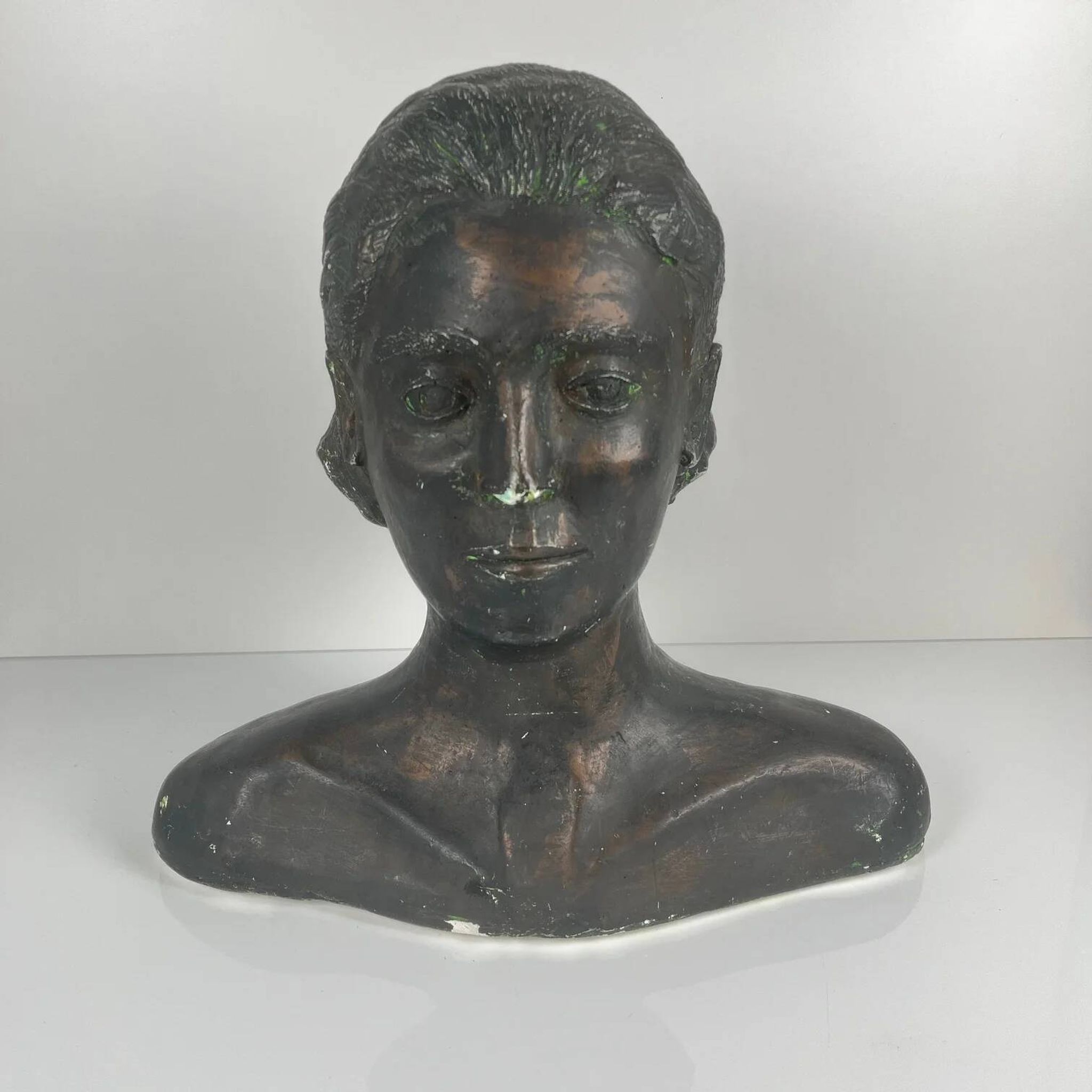 Female bust in neoclassical style in plaster by M. Mongey, 20th century.