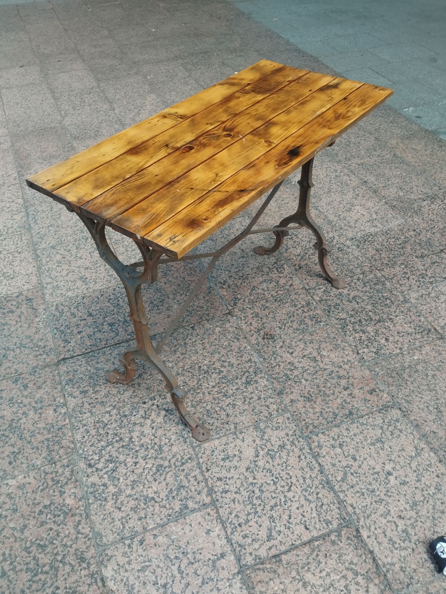 Old bistro table with a wooden top