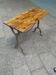 Old bistro table with a wooden top