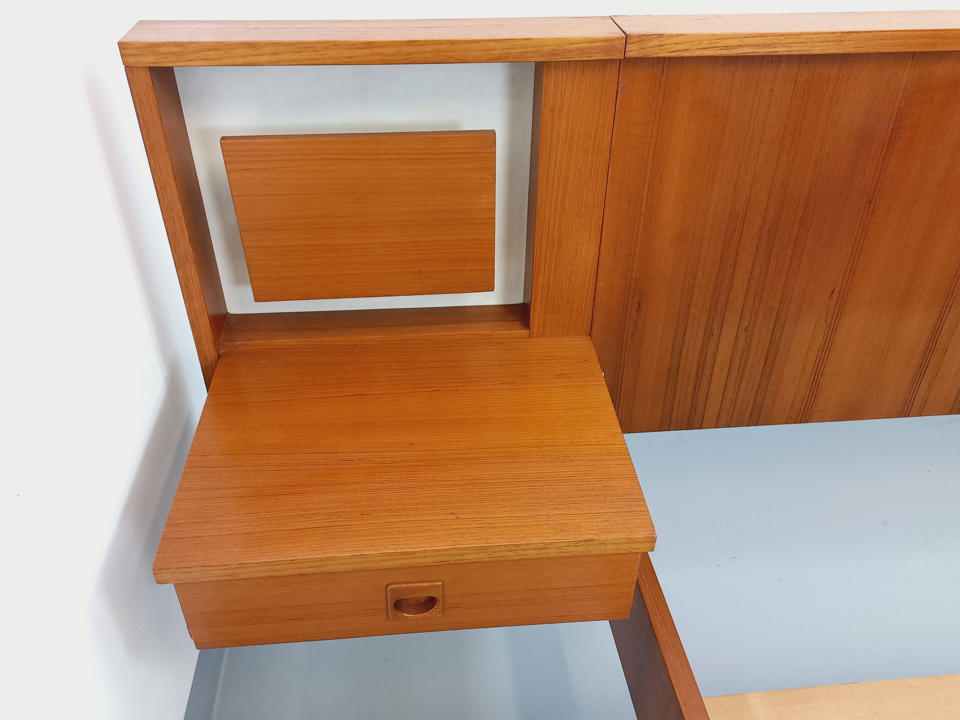 Vintage Scandinavian style double bed in teak from the 60s with integrated bedside lights